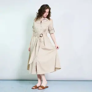 MulherVestidos de distribuidor de roupas Blue Denim em Itália