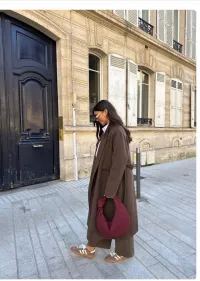 MulherCasacos de distribuidor de roupas luis fashion srls em Itália